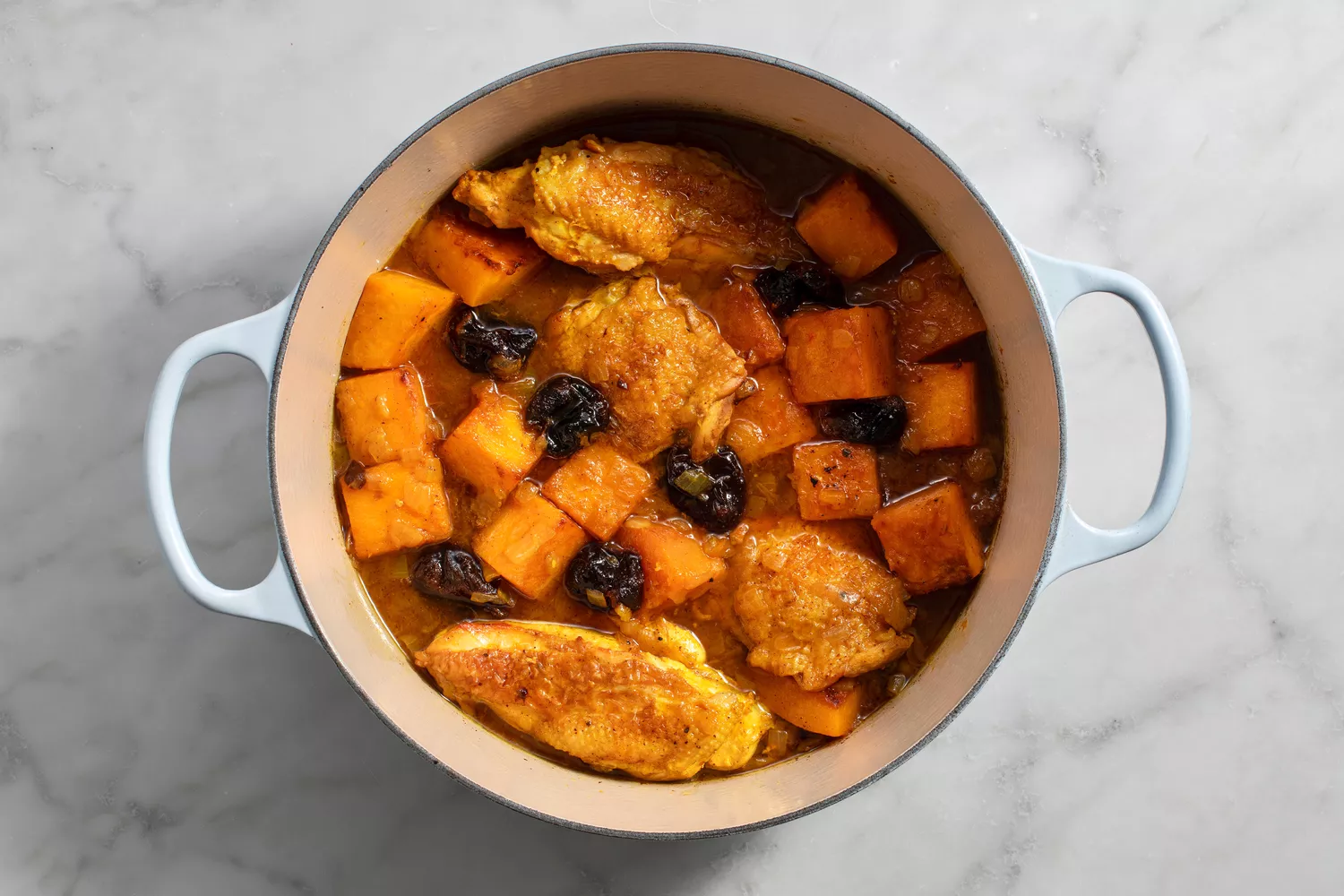 saffron water added to pot of nearly finished braise