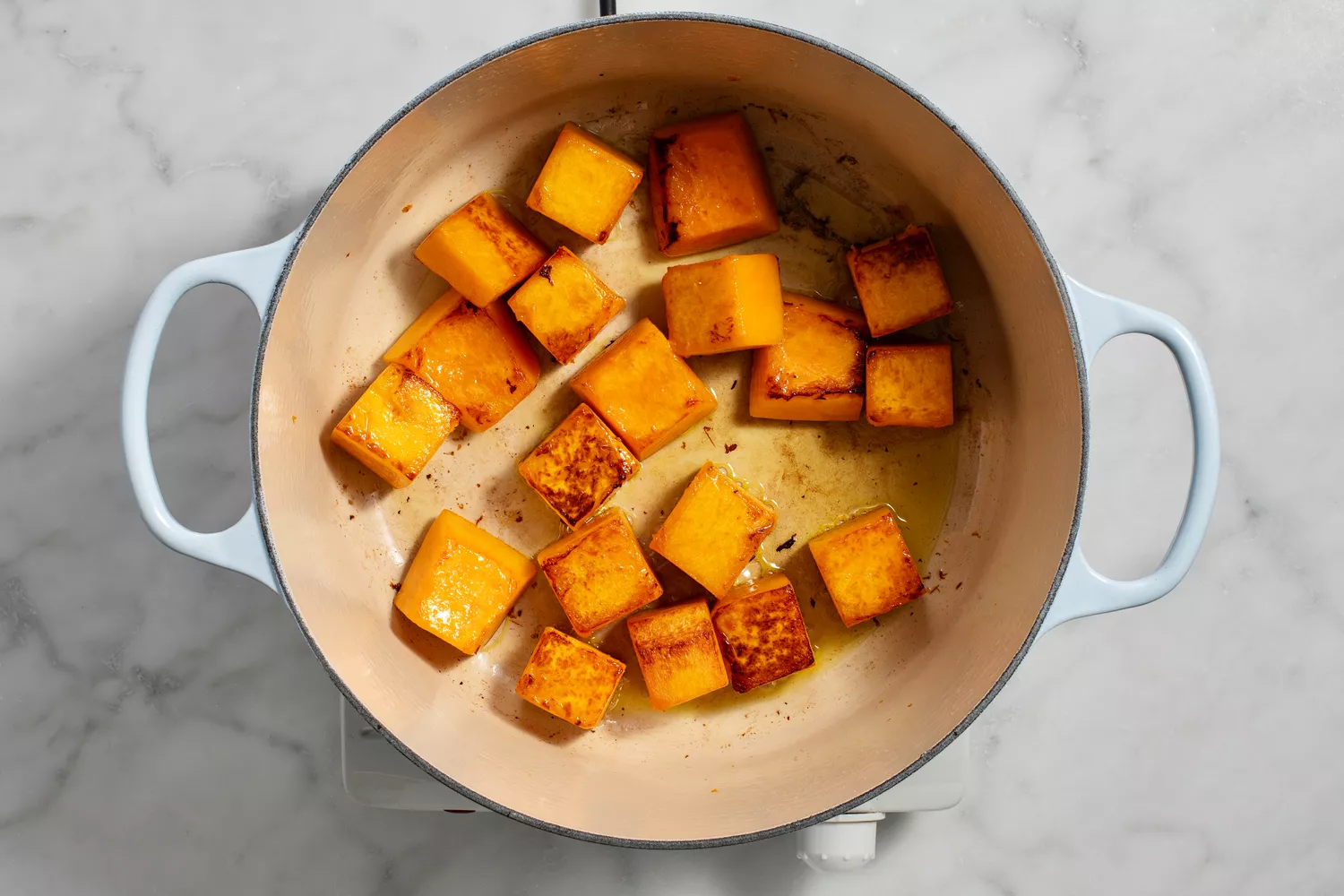 butternut squash sauteeing in pot
