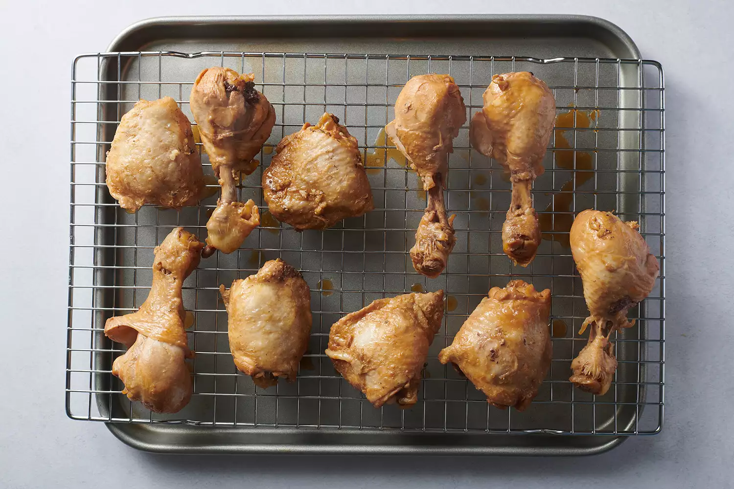 cooked chicken on a wire rack
